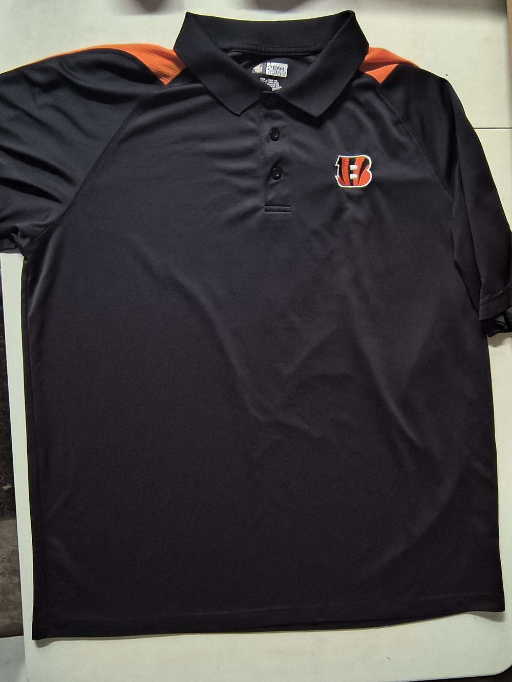 Team Apparel Cincinnati Bengals Black Polo with Orange Shoulder Accents